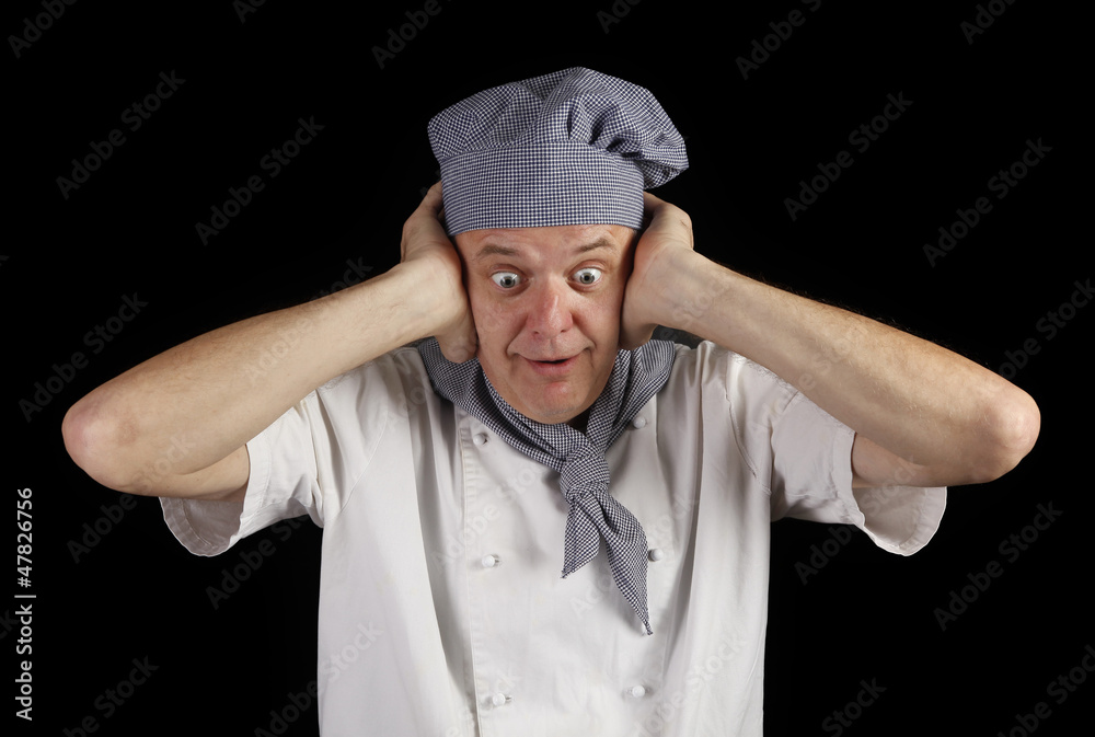 Scared cook is holding his head because he ruined meal Scared cook is holding his head because he ruined meal