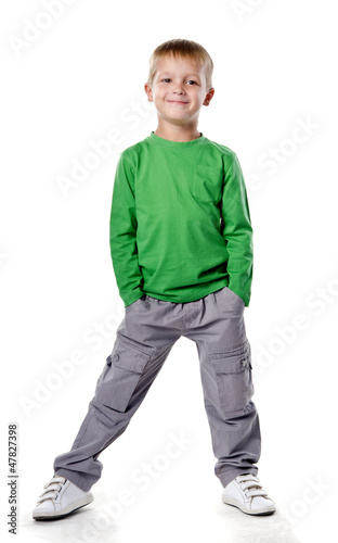 Portrait of happy joyful beautiful little boy isolated on white