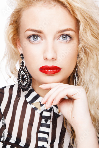 blond woman with colorful makeup