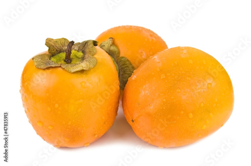 three persimmons
