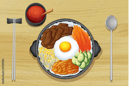 Fried egg with salad in dish