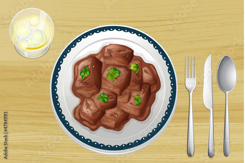 Pork dish on a wooden table