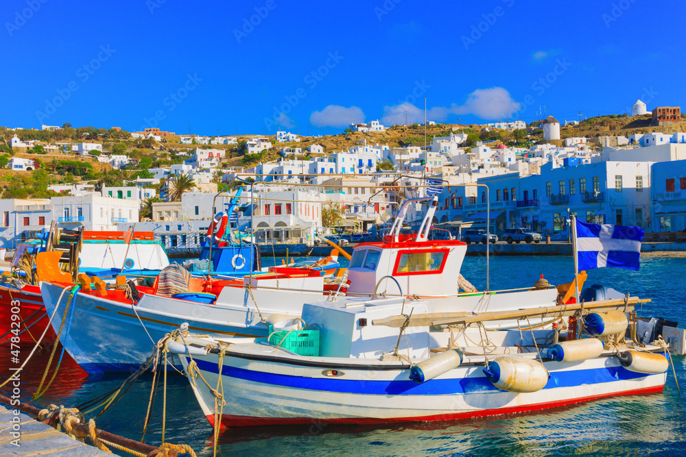 Colorful wooden fishing boats on row  Mykonos island old port Gr - obrazy, fototapety, plakaty 