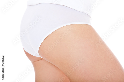 Weibliche Person in weißer Unterwäsche