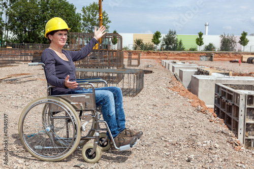 Engineer in a wheelchair on site photo