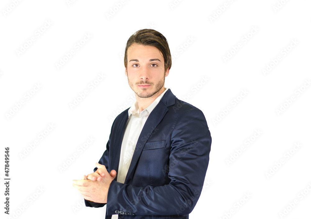 Handsome young man in suit looking in camera Handsome young man in suit looking in camera