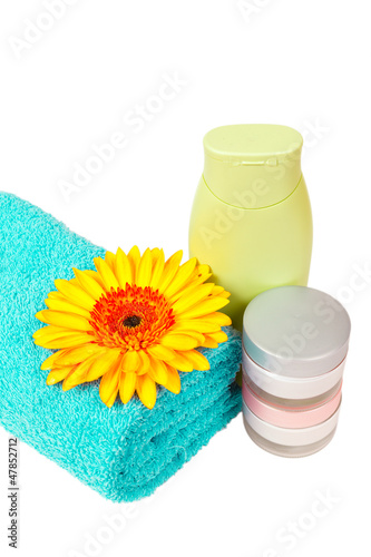 turquoise towel, nail polish, gerbera