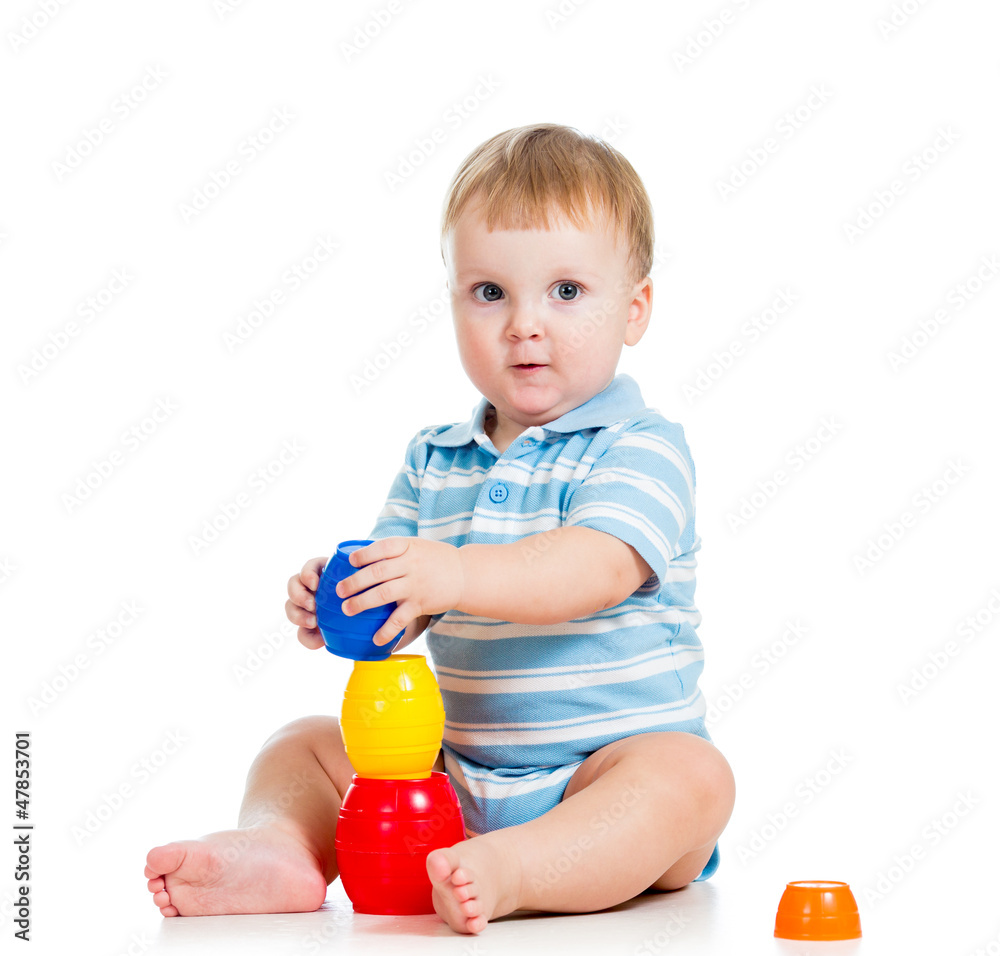 baby boy playing with toys, isolated over white baby boy playing with toys, isolated over white