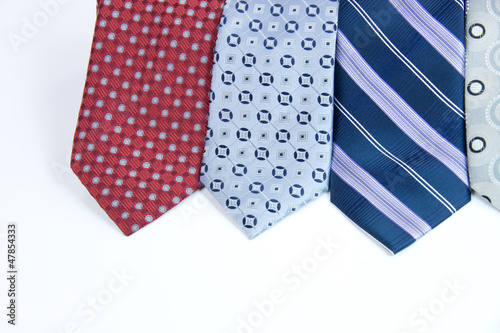 Selection of business silk ties isolated on white