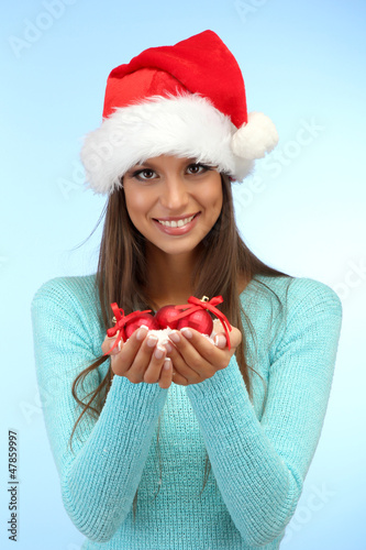 beautiful young woman holdi...