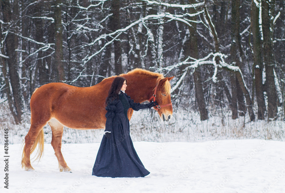 Beautiful woman and horse in winter Beautiful woman and horse in winter
