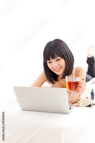 attractive asian woman  using laptop computer