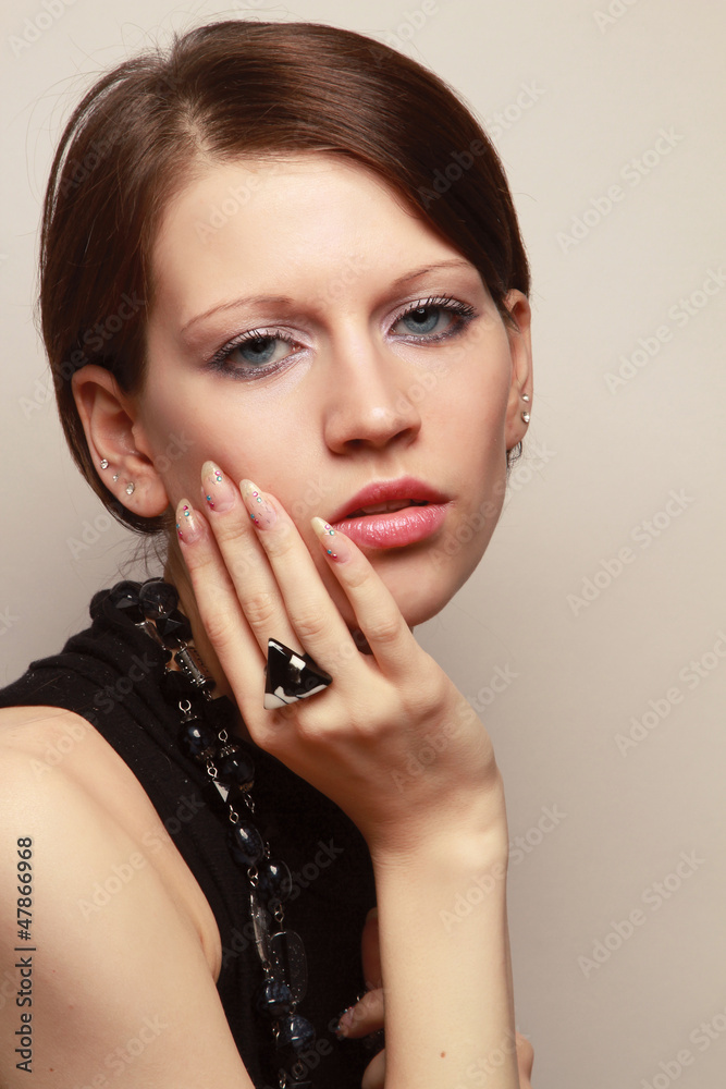 Fototapeta premium Portrait of a young woman standing