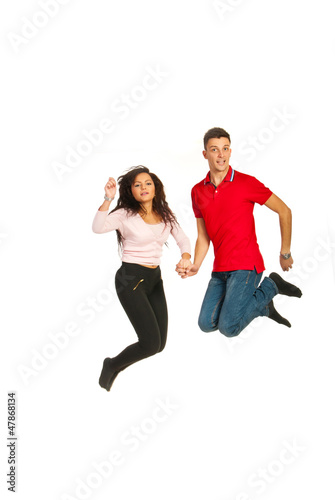 Jumping happy couple