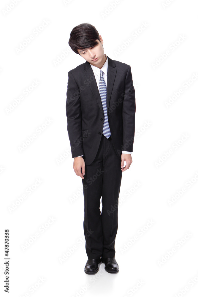 business man looking depressed from work