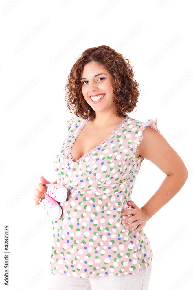 Beautiful pregnant woman showing her good shape