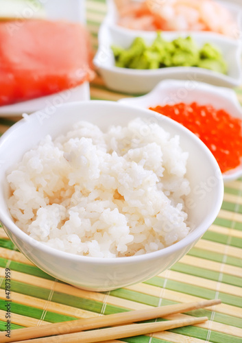 ingredients for sushi, sakmon and cucumber