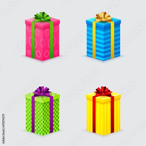 four unopened gift boxes with ribbons and bows with lids