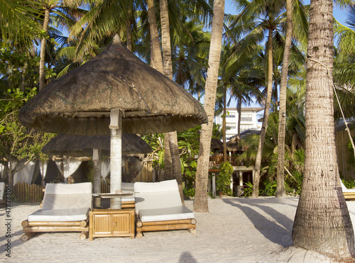 deck chairs on tropical beach