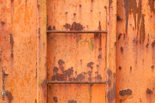 steps of old orange and rusty container © ahavelaar