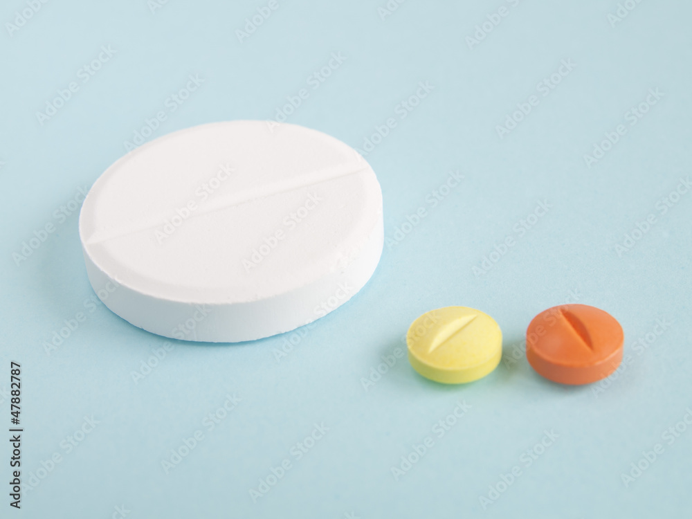 Close up colorful pills , isolated on white background