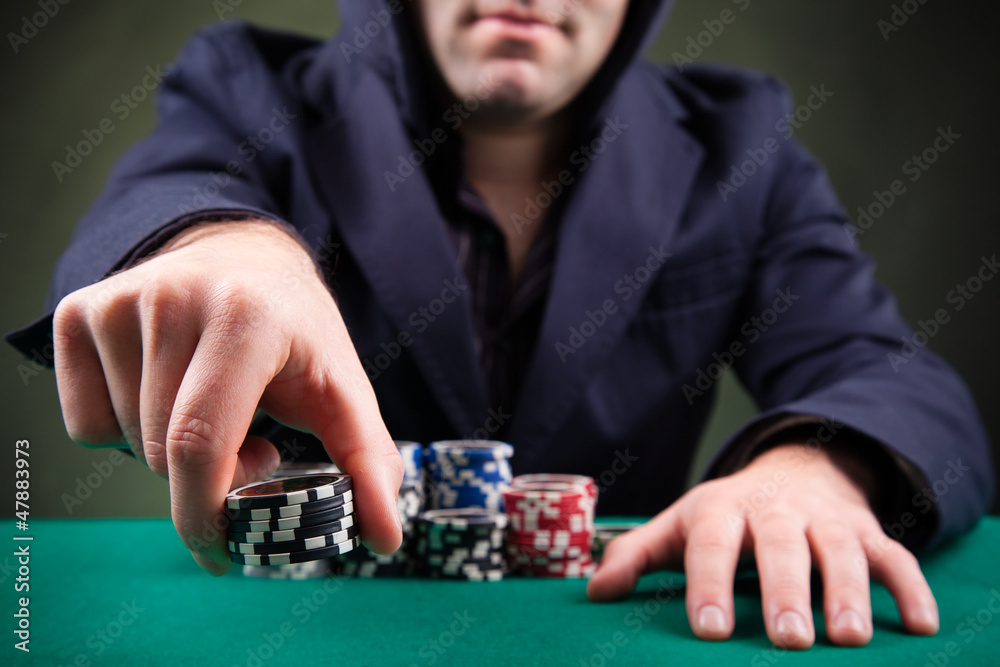 Poker player on black background Poker player on black background