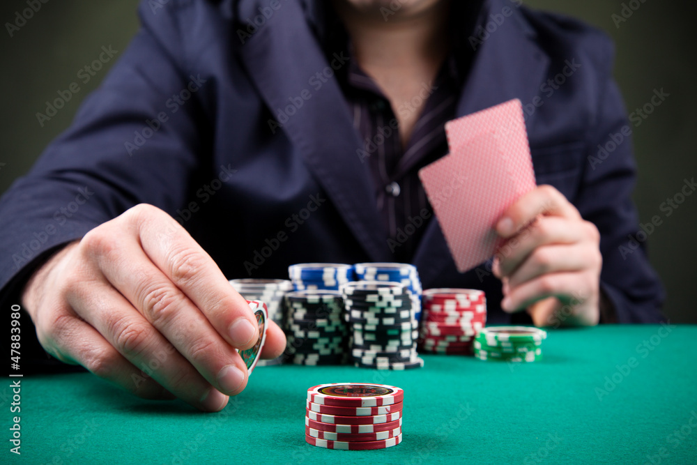 Poker player on black background Poker player on black background