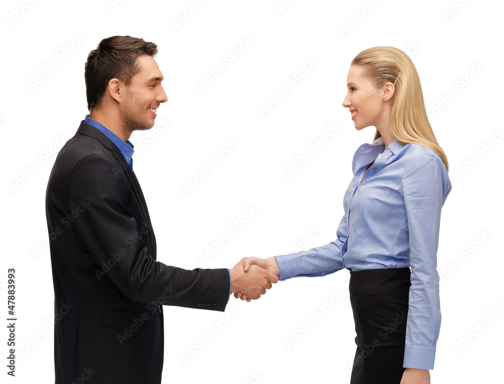 man and woman shaking their hands man and woman shaking their hands