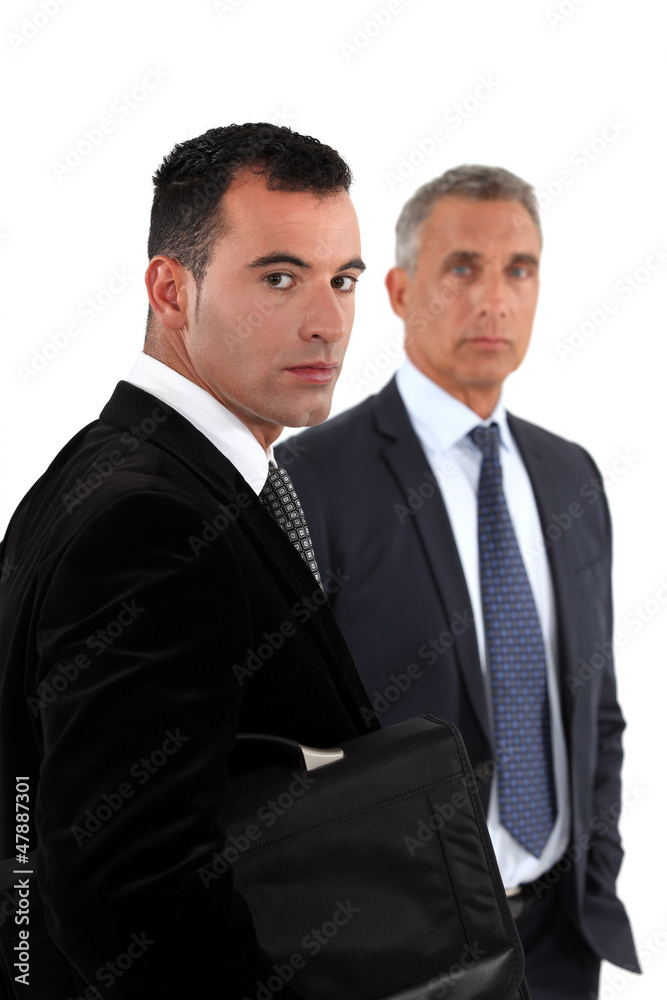Two businessmen with satchel