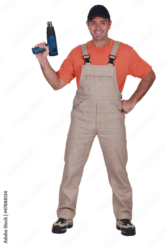 Man holding heat-gun Man holding heat-gun