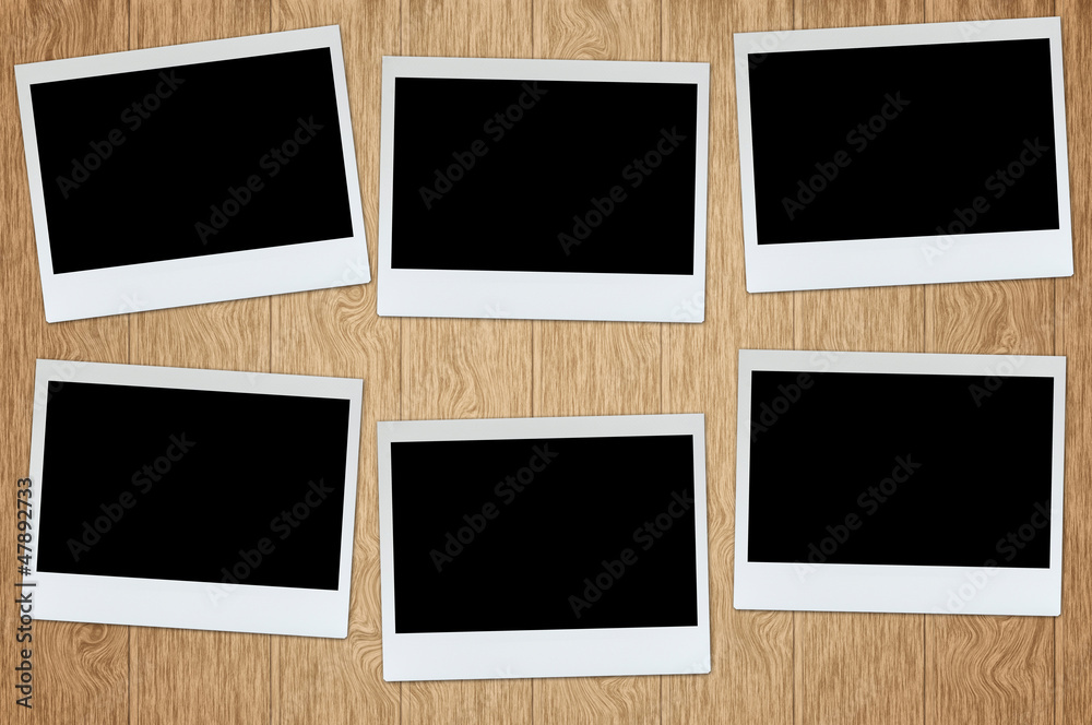 photo frame on wood plank background with clipping path