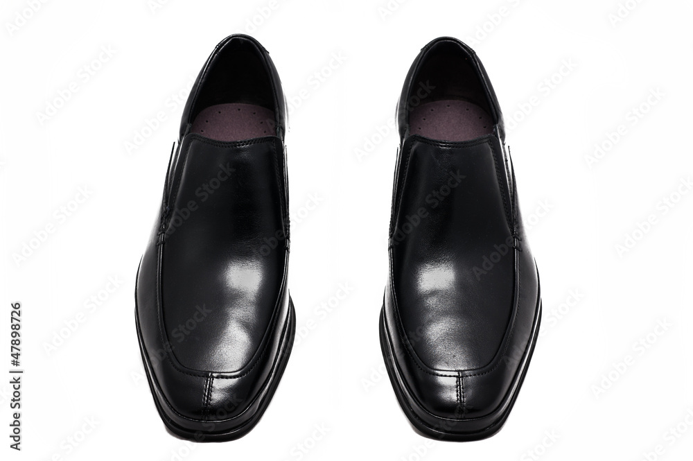The male black shoes on white background The male black shoes on white background