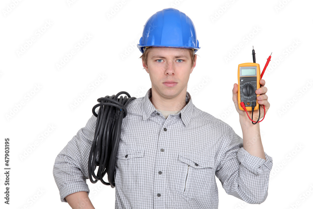 Electrician showing multimeter