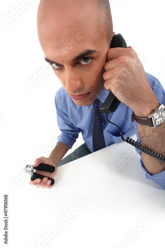 Civil servant squeezing hand grippers photo