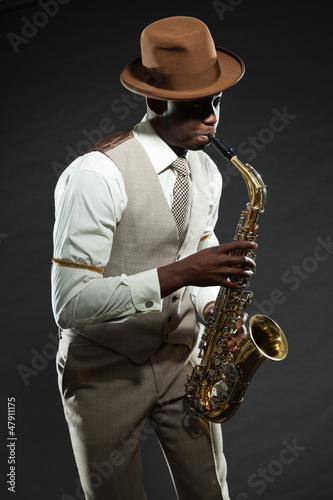 Sticker Black american jazz saxophone player. Vintage. Studio shot.
