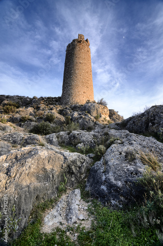 Outlined on a hilltop are the ruins of the Castle of Xiquena