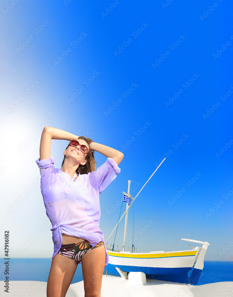 Young woman in Oia  Santorini island Greece