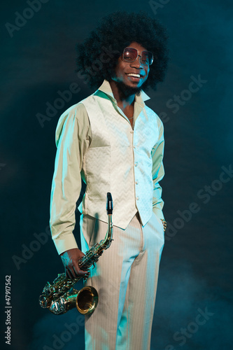 Canvas Print Black american jazz saxophone player. Vintage. Studio shot.