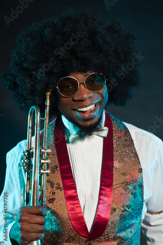 Black american jazz trumpet player. Vintage. Studio shot.