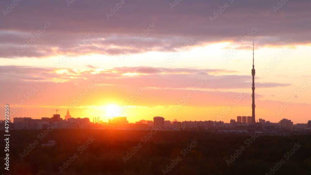 Buildings of city and television tower of Ostankino stand in Buildings of city and television tower of Ostankino stand in