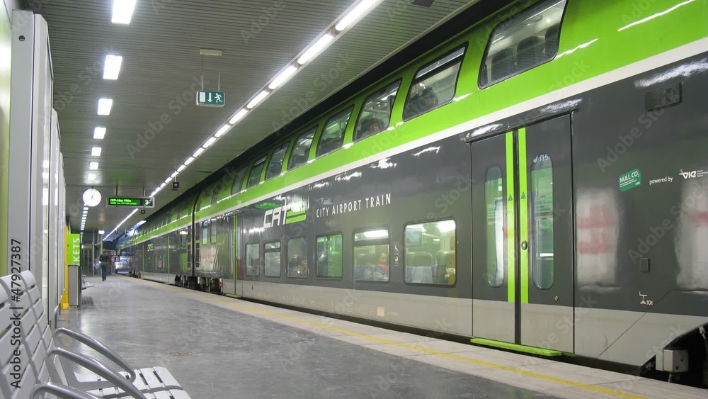 Train goes to airport from station platform Train goes to airport from station platform