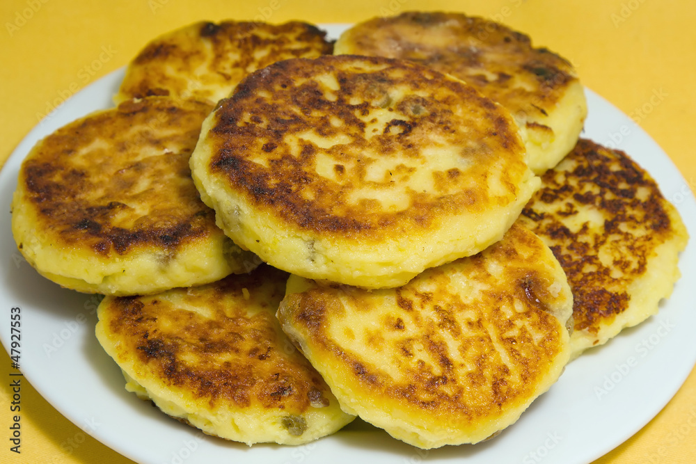 Sweet cheese pancakes on a plate