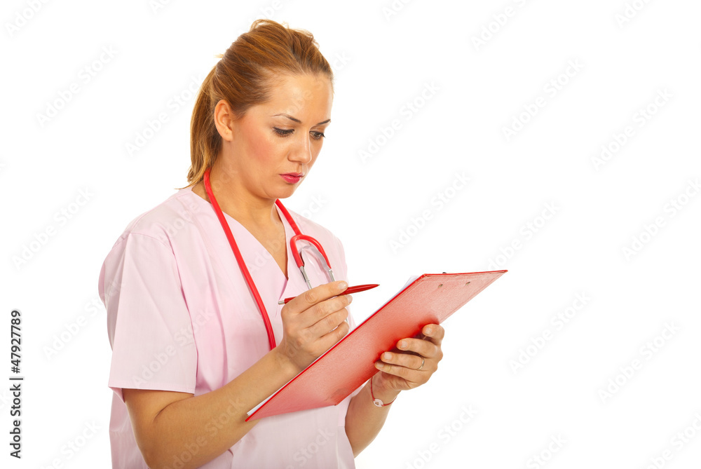 Doctor woman write in clipboard Doctor woman write in clipboard