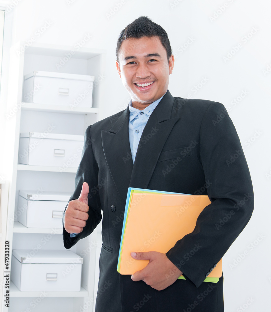 Thumb up Southeast Asian executive Thumb up Southeast Asian executive