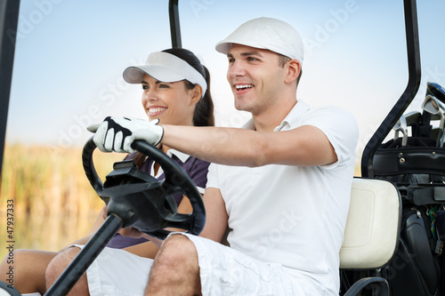 Happy golf couple