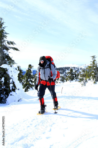 Winter hiking in snowshoes.