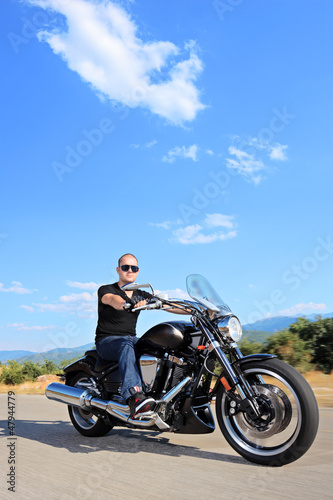 Biker riding a customized motorcycle