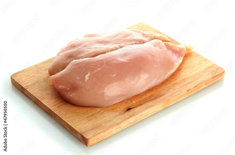 raw chicken meat on cutting board, isolated on white raw chicken meat on cutting board, isolated on white