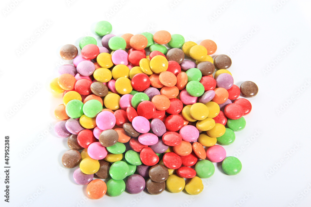 Obraz premium sweet candies spreading pastry decoration background