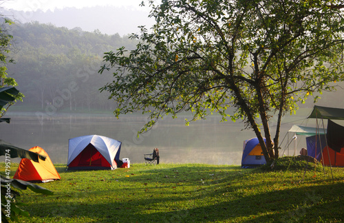 Fényképezés Tents in recreation area near the reservoir, Thailand.